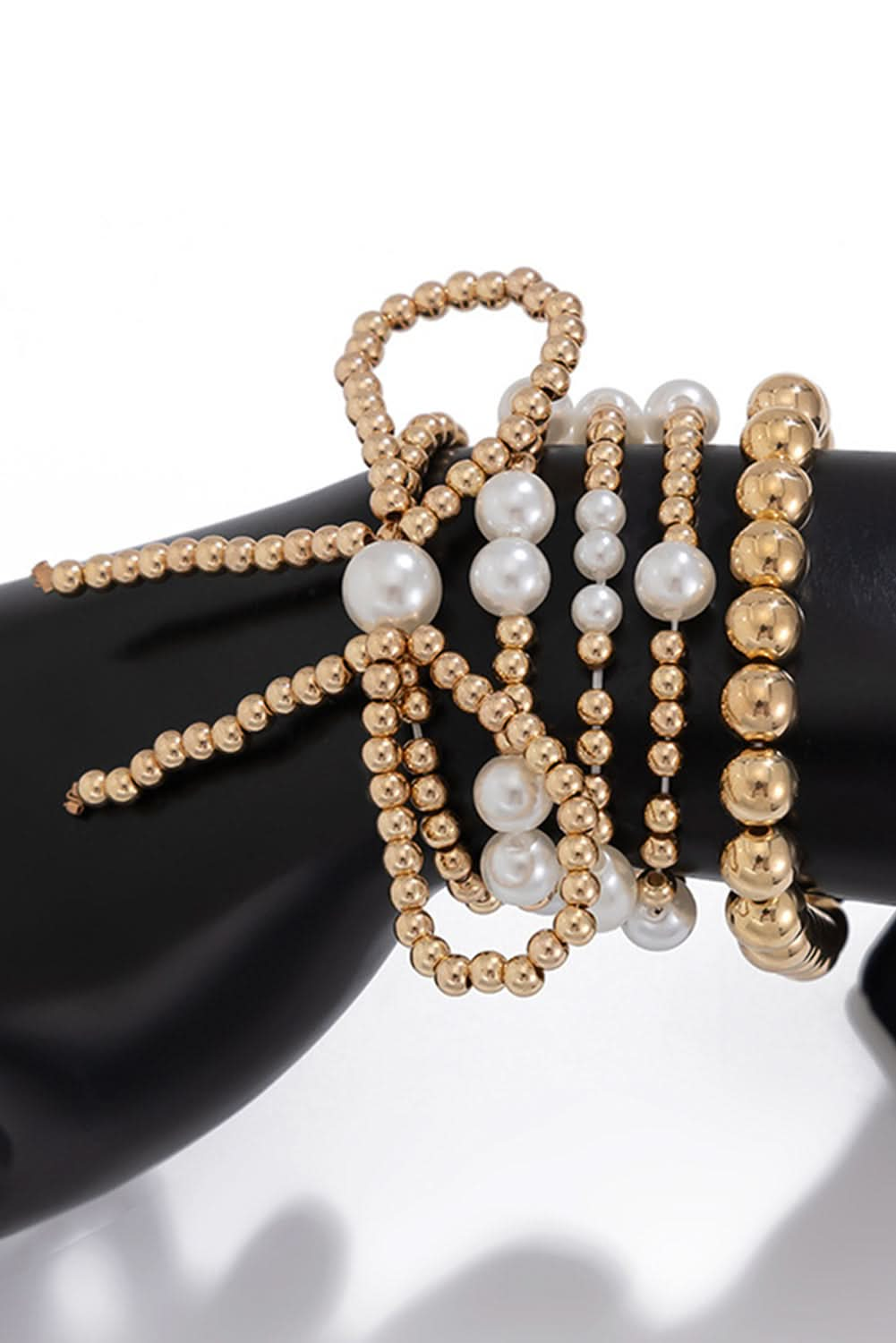 Gold Bow Knot Pearl Beaded Multi Layered Bracelet Set.