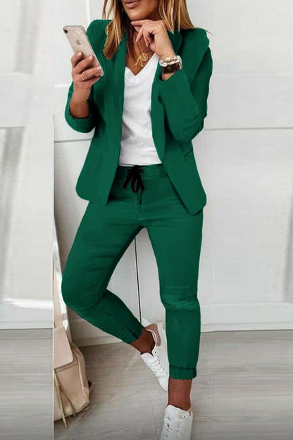 Elegant monochrome pantsuit Estrena, Light Green