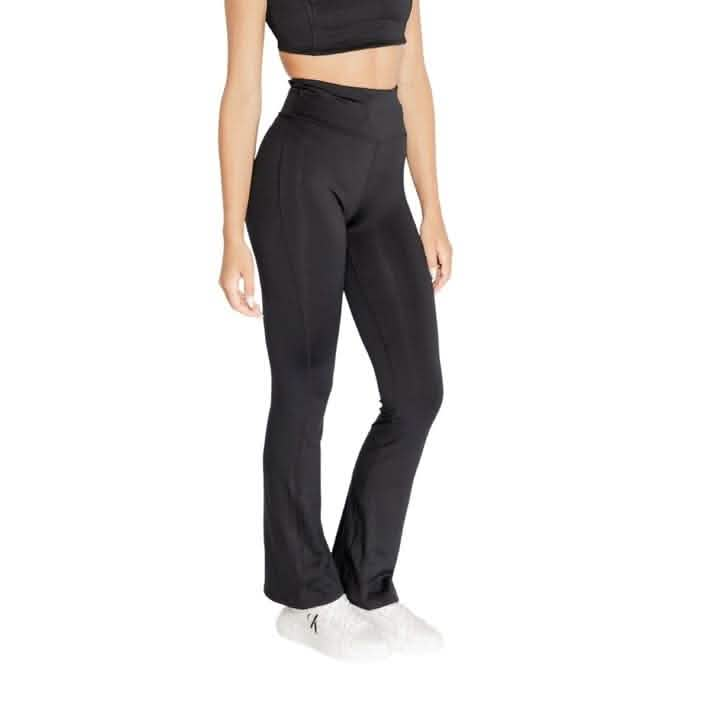 Black high-waisted flared yoga pants.