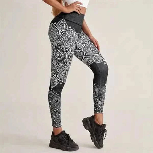 Athletic leggings with black and white mandala print pattern.