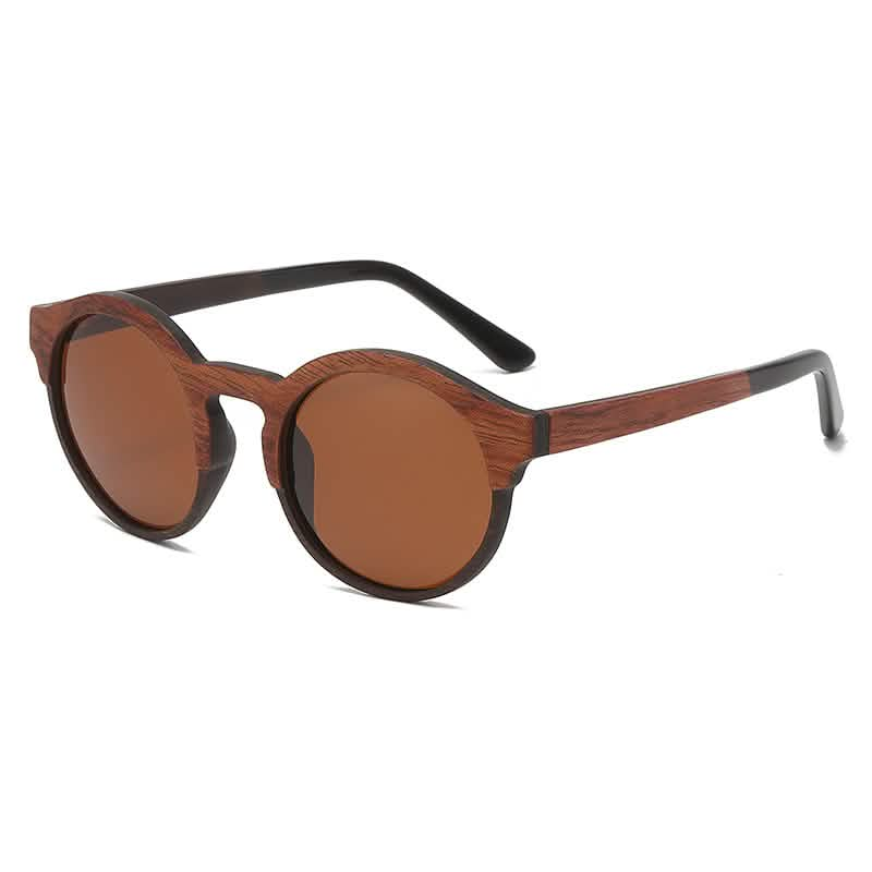 Round retro fashion sunglasses with a laminated wood and solid wood frame, featuring brown lenses and black temple arms.