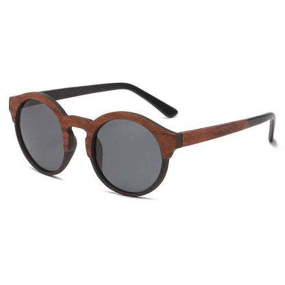 Retro round-frame sunglasses with laminated wood and solid wood design, featuring dark lenses and black temple arms.