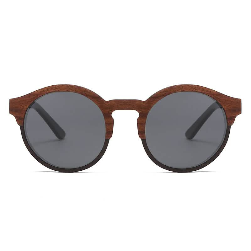 Retro round sunglasses with a laminated wood frame, solid wood details, and dark lenses displayed on a white background.