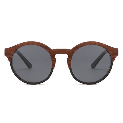 Retro round sunglasses with a laminated wood frame, solid wood details, and dark lenses displayed on a white background.