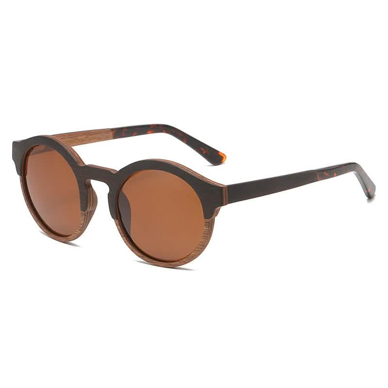 Retro round-frame sunglasses with laminated wood and solid wood design, featuring brown-tinted lenses for fashionable style.