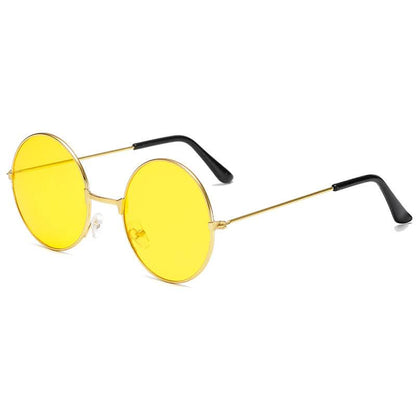 Retro round sunglasses with thin gold frames, yellow-tinted lenses, and black temple tips displayed at an angle.