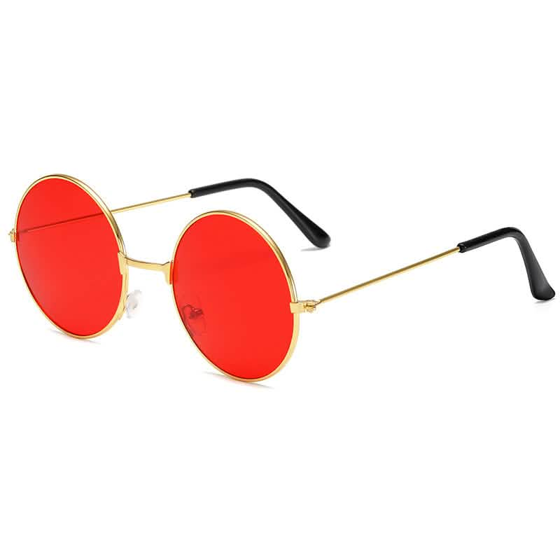 Retro round sunglasses with red lenses, gold metal frame, and black temple tips. Trendy, colorful design for wholesale purchase.