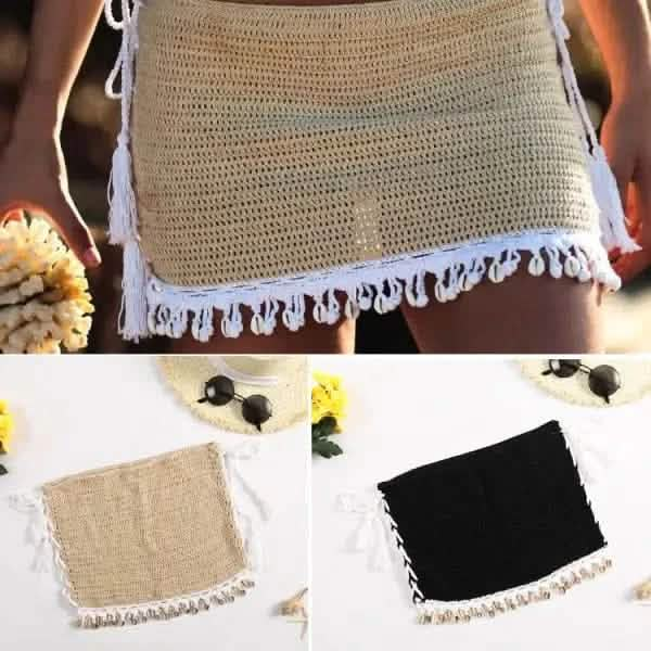 Crocheted beach skirt with decorative fringe trim available in beige and black colors.