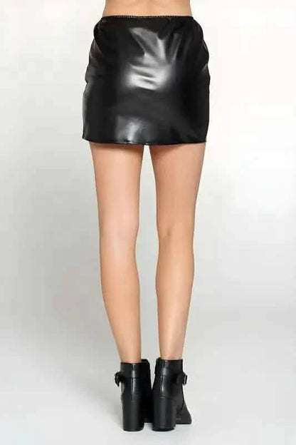 Black faux leather mini skirt with a straight hemline.