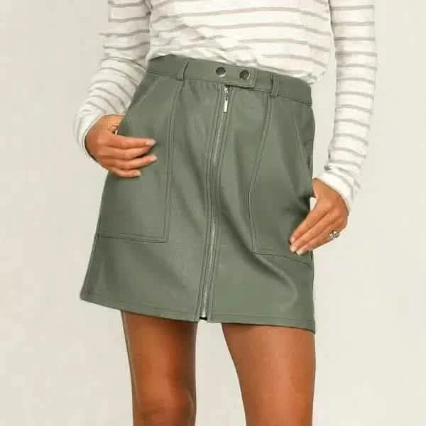 Olive green faux leather mini skirt with front zipper and utility pockets.