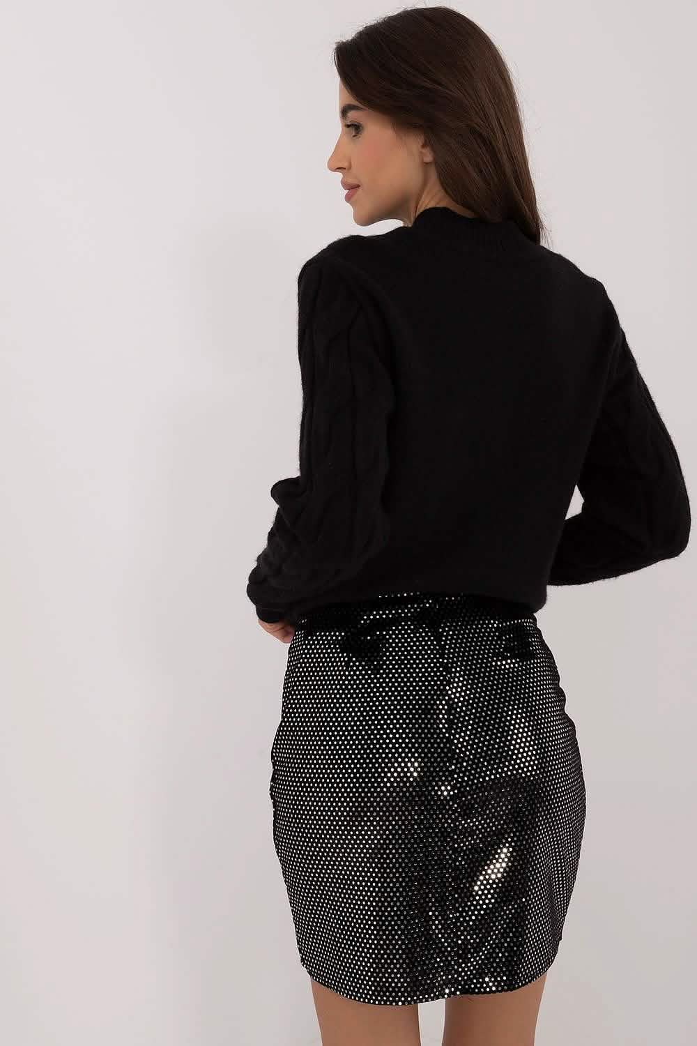 Sparkly black and silver polka dot mini skirt with a tied waist bow.