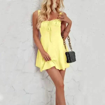 Yellow strapless mini dress with a drawstring neckline.