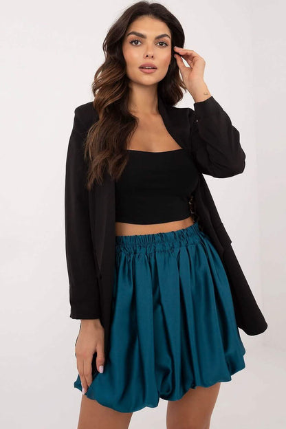 Teal pleated mini skirt with elastic waistband.