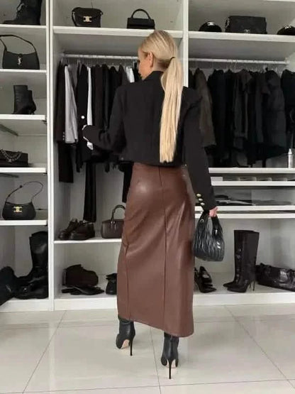 Long brown leather pencil skirt paired with a black turtleneck sweater.