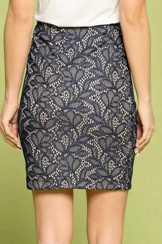 Black lace pencil skirt with floral pattern overlay.