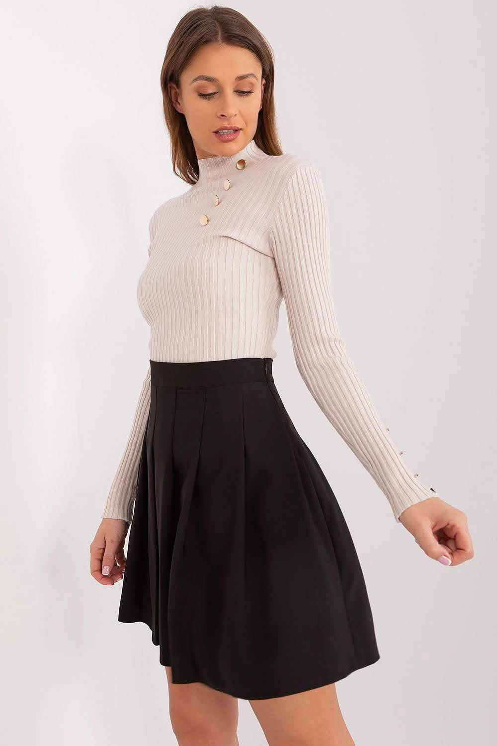 Black and white outfit featuring a ribbed turtleneck sweater paired with a flared skater skirt.