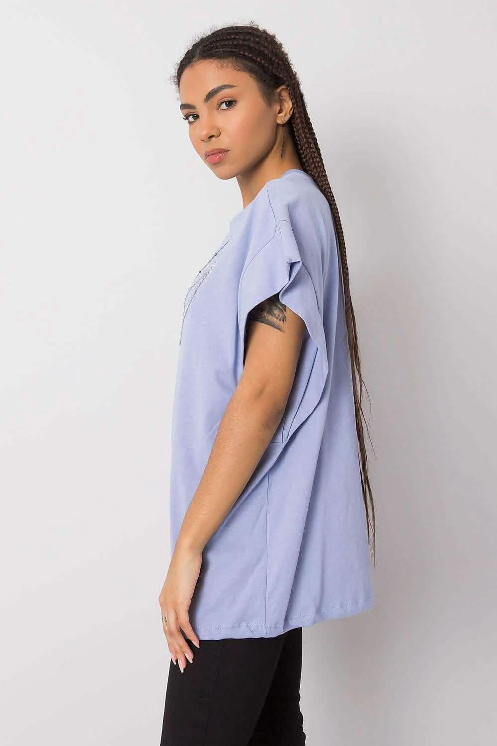 Light blue oversized t-shirt with short sleeves.