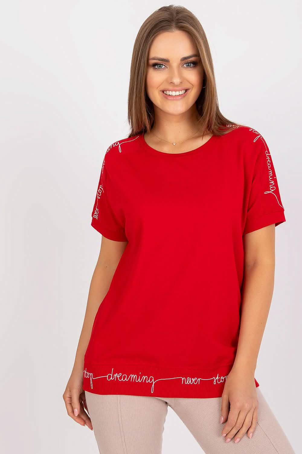 Red t-shirt with decorative trim along the sleeves and bottom hem.