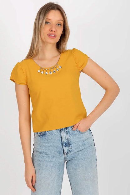 Mustard yellow t-shirt with rhinestone embellishment at the neckline.