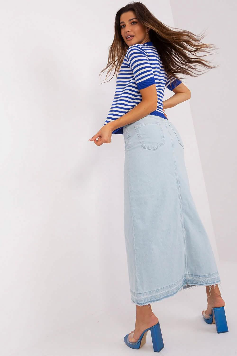 Light blue denim midi skirt with frayed hem detailing.