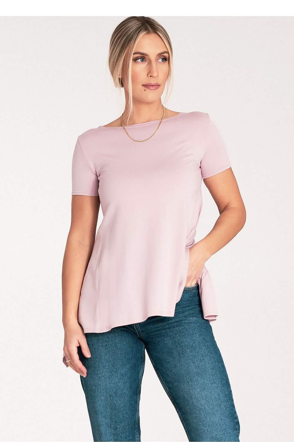 Light pink short-sleeved t-shirt with a relaxed fit silhouette.