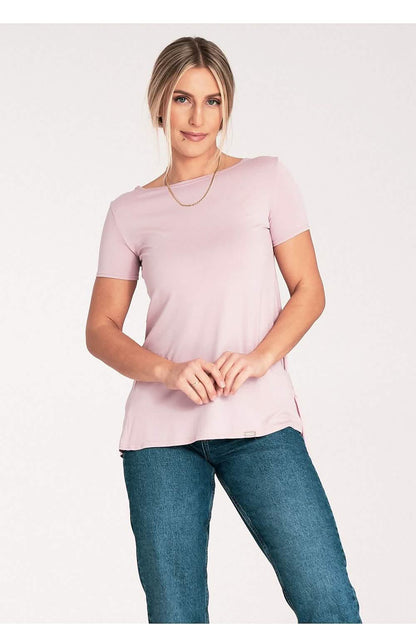 Light pink crew neck t-shirt paired with blue jeans.