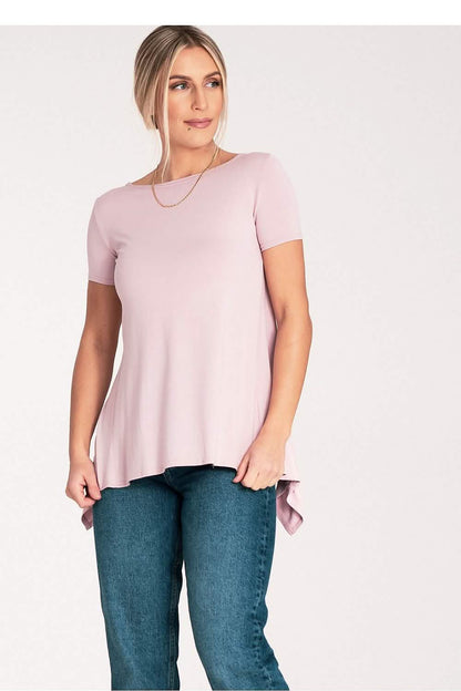 Pale pink short-sleeved top with a flared hem.