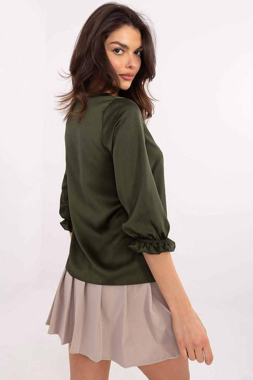 Olive green blouse with ruffled three-quarter length sleeves.