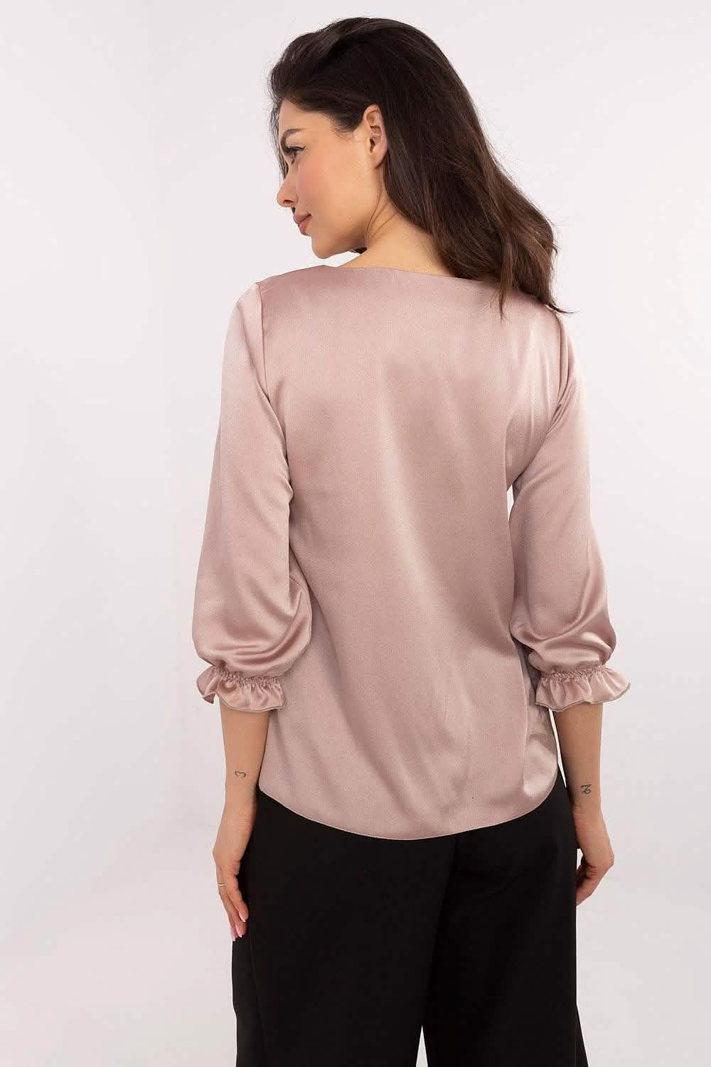 Dusty pink satin blouse with gathered three-quarter length sleeves.