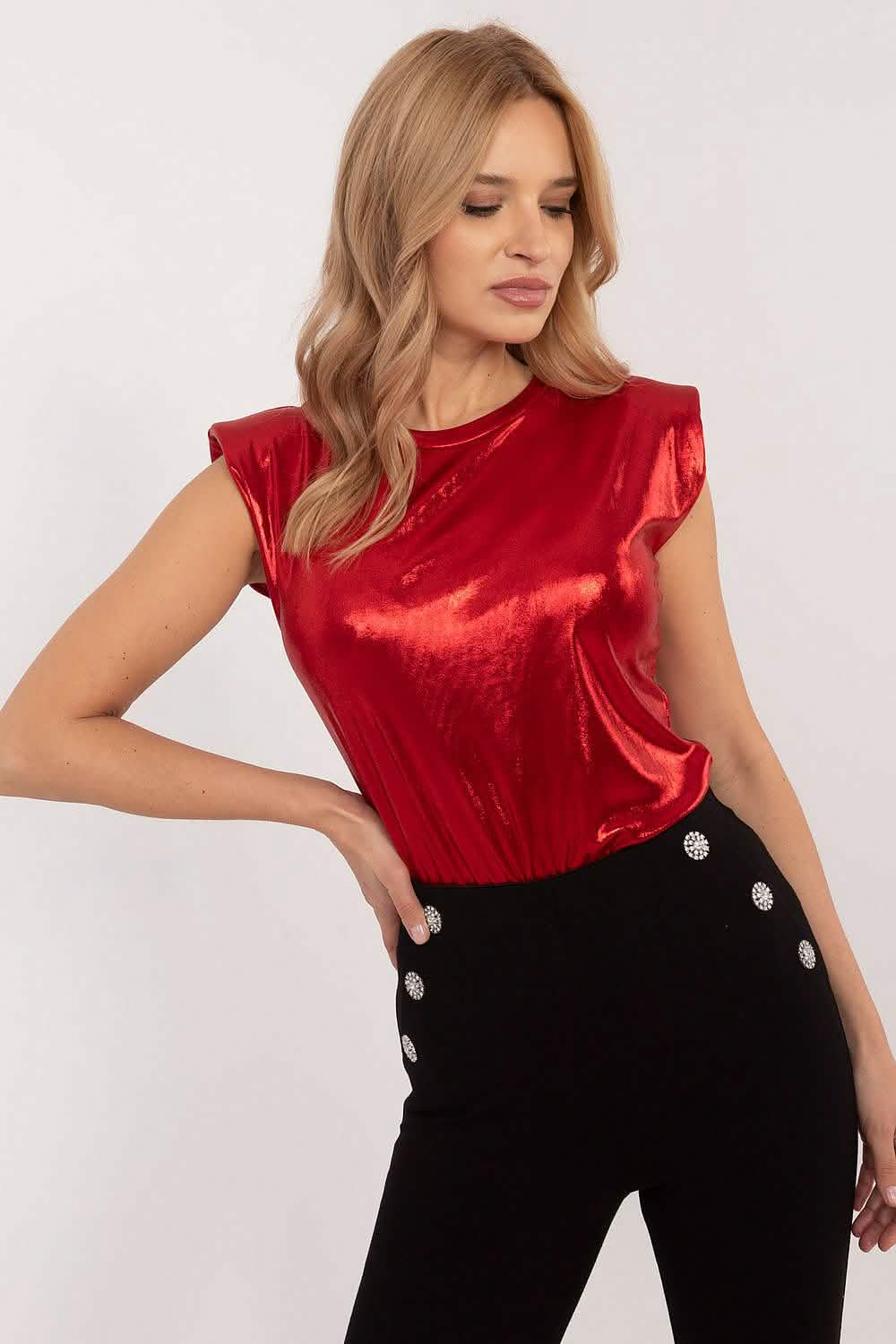 Sleeveless red satin blouse with ruffled cap sleeves.