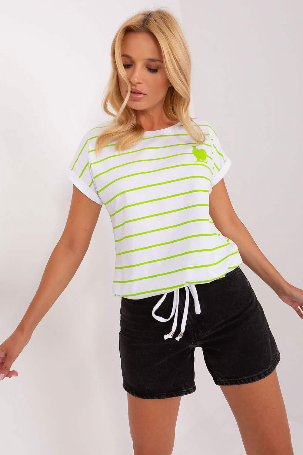 White t-shirt with neon yellow horizontal stripes paired with black drawstring shorts.