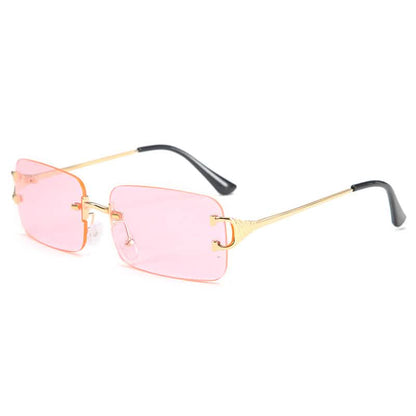 Trendy small-frame sunglasses with pink rectangular lenses, gold-tone metal frames, and black ear tips for modern street fashion.