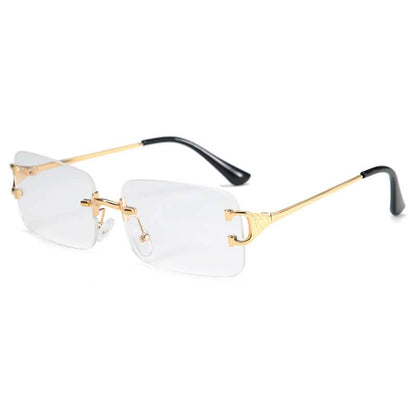 Small-frame sunglasses with rimless clear lenses, gold-tone temples, and black tips; trendy European and American fashion style.