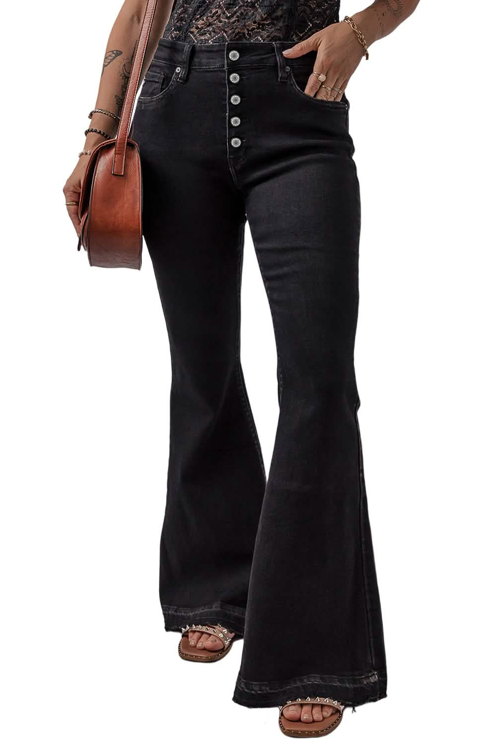 Black denim flared jeans with button-fly closure.