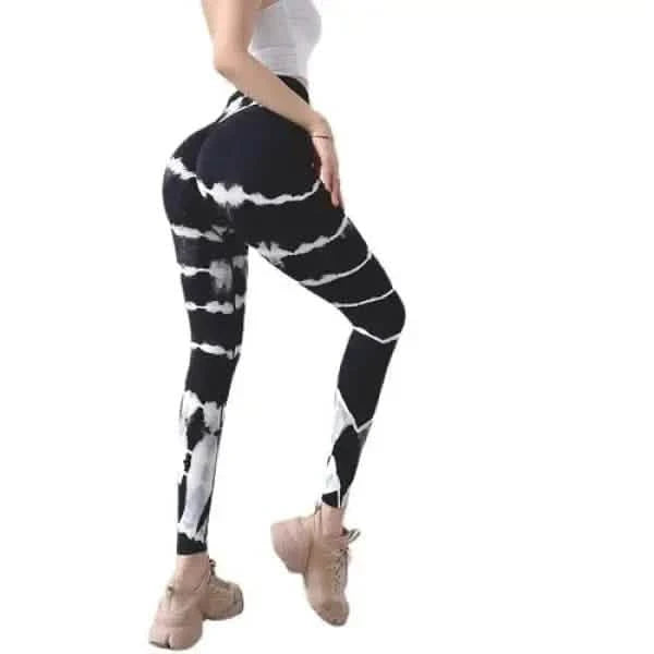 Black and white tie-dye leggings with a striped pattern.