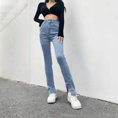 Light blue high-waisted straight-leg jeans with a side slit detail at the hem.