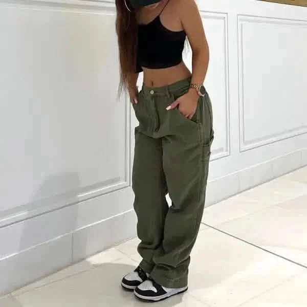 Olive green cargo pants paired with a black crop top.