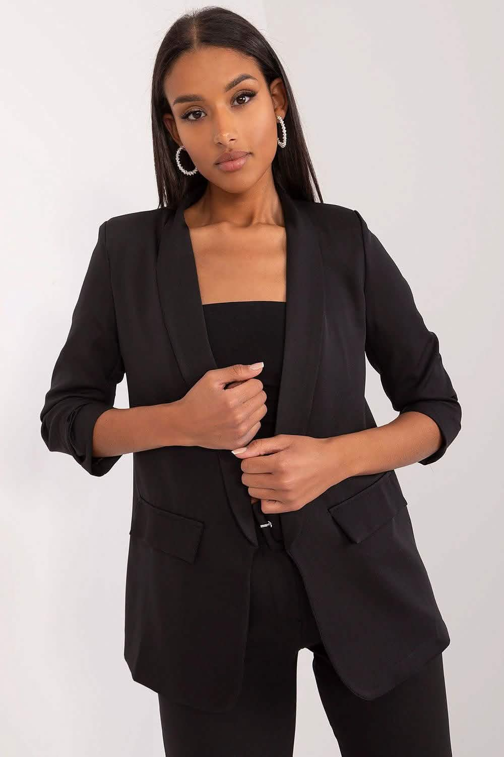 Classic black blazer with ruched three-quarter length sleeves.