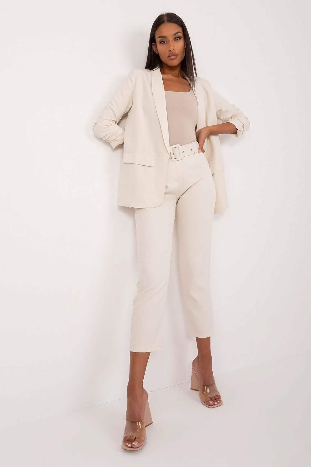 Cream-colored business suit with cropped pants and matching blazer.