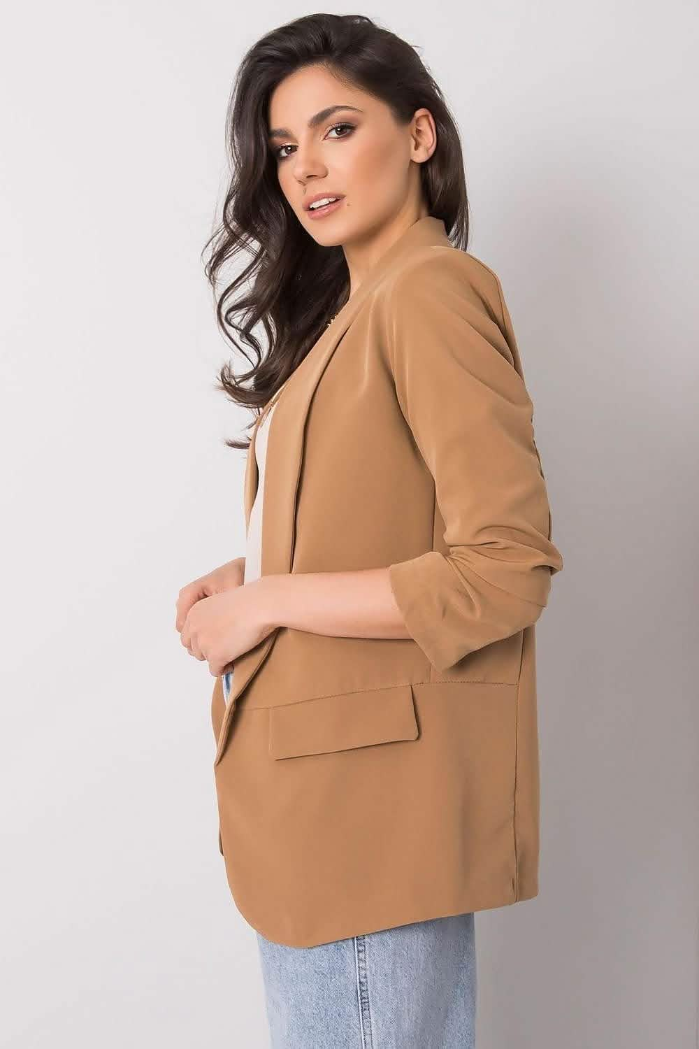 Camel-colored blazer with front pockets and three-quarter length sleeves.