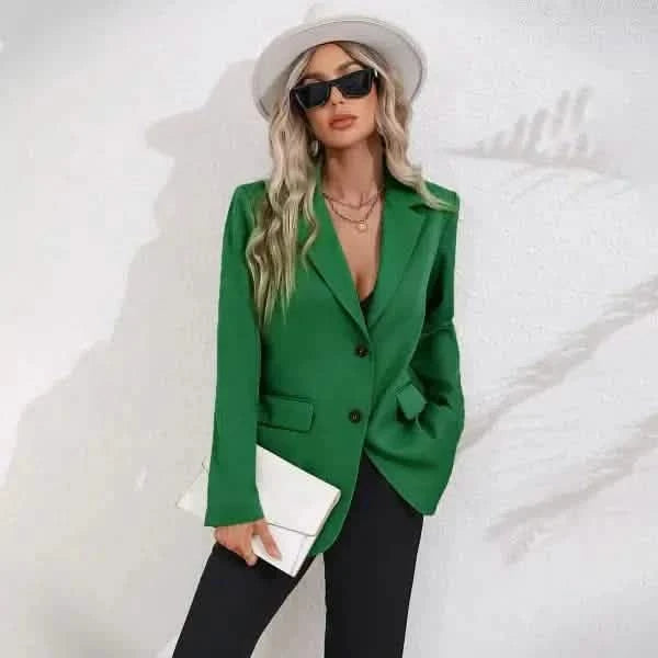 Vibrant emerald green blazer with notched lapels and two buttons.