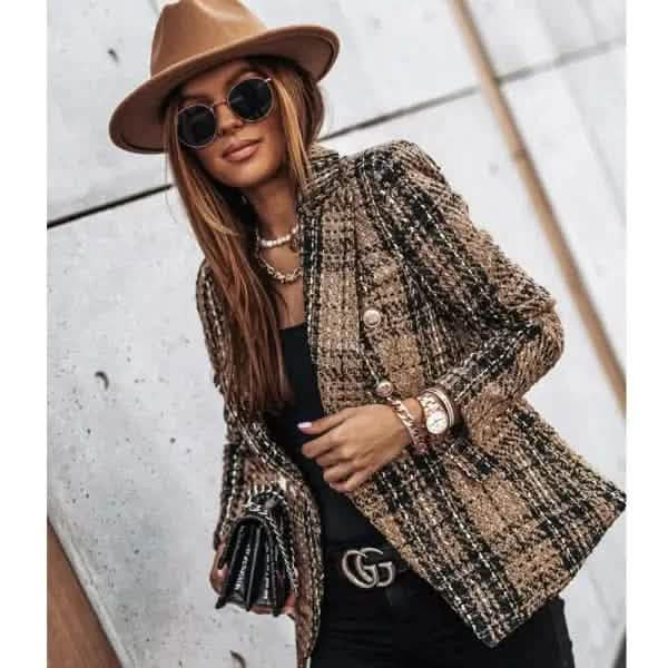 Tweed blazer in brown and beige tones with textured fabric.